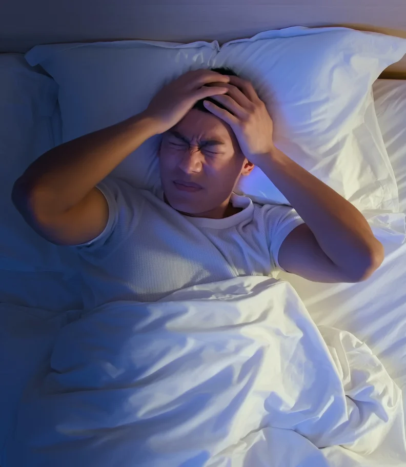 man experiencing headaches in Waterloo IA